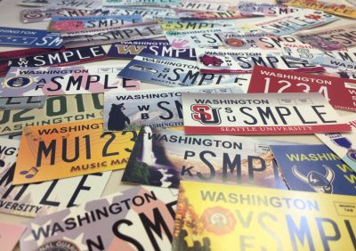 A pile of license plates spread out.